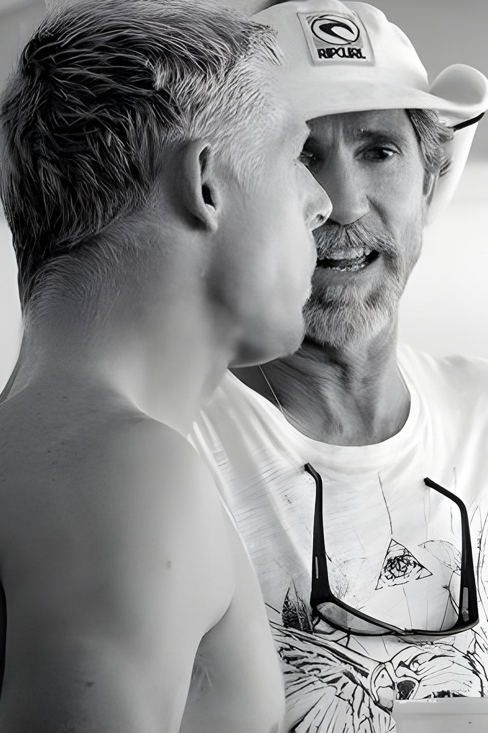 Phil McNamara in conversation with a young athlete